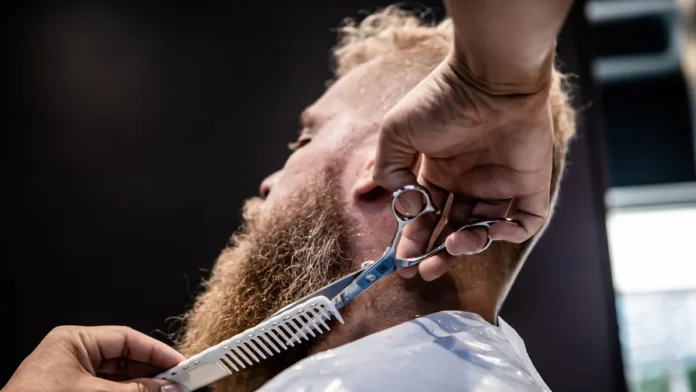 Beard Dye Barber grooming a man's beard