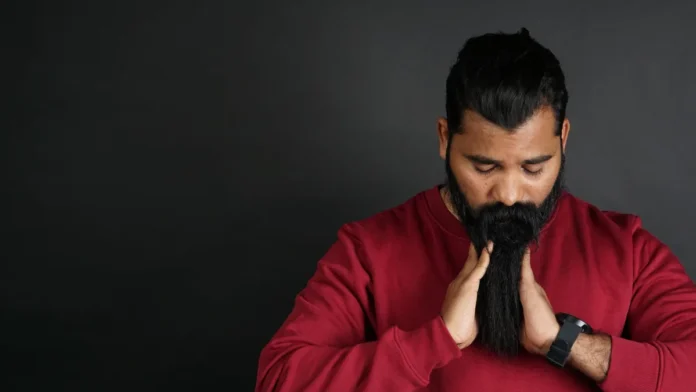 Beard Oil vs Beard Balm Man with a well-groomed, conditioned beard