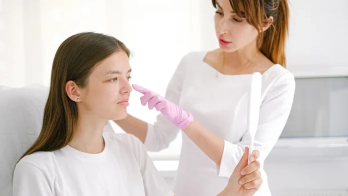 Cosmetic Treatments Guide Woman having a cosmetic treatment consultation in a clinic