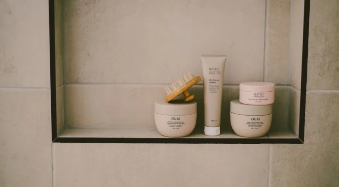 Curl Defining Cream: How to Choose and Use One for Your Curl Type Curl defining cream and hair products on a bathroom shelf
