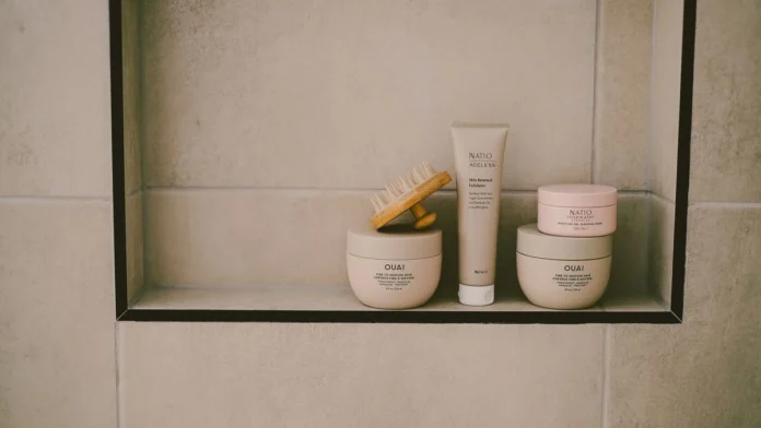 Curl Defining Cream Curl defining cream and hair products on a bathroom shelf