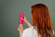 Curl Enhancing Mousse vs Gel: Which Gives Better Definition? Applying styling product to hair, curl mousse versus gel