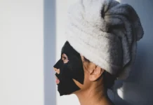 Face Masks for Skin: Choosing the Right Type for Your Concern Woman relaxing with a face mask on