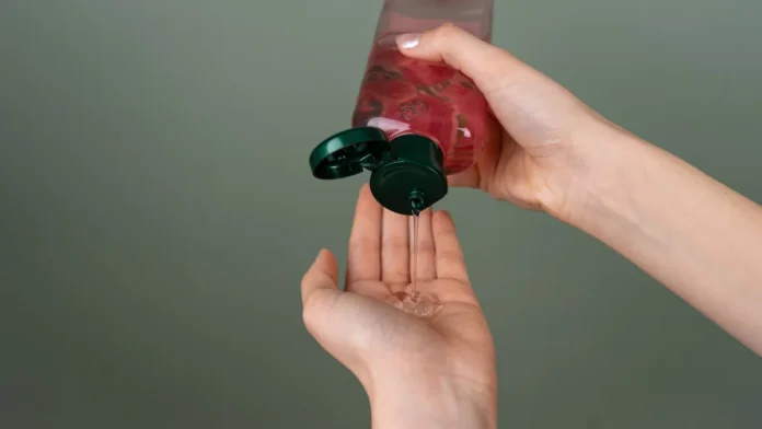 Dispensing frizz control gel from a bottle into a palm