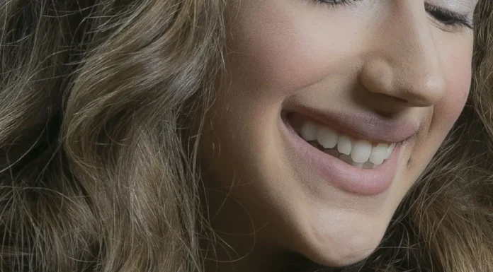 Hair Crimper: The Volume Trick Nobody Sees (and the 2026 Way to Wear It) Woman with wavy textured hair from a crimper or waver