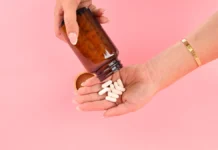 Hair Growth Supplements: What Works, What Doesn’t, and the Biotin Blood-Test Warning Hair growth supplement capsules from a bottle