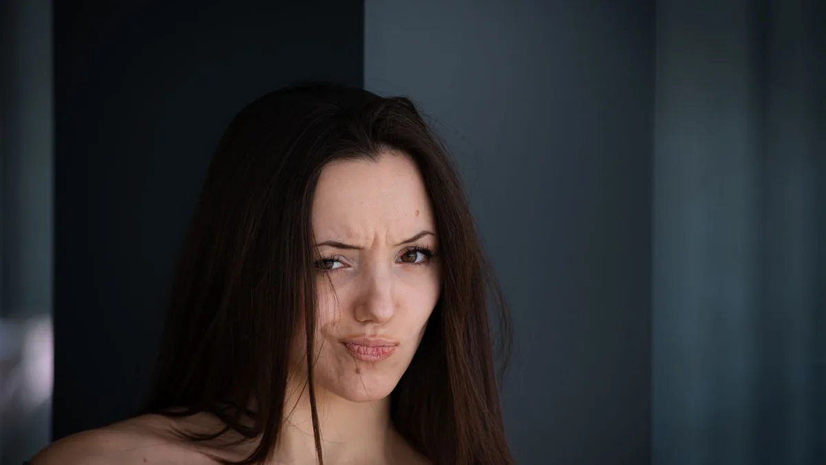 Portrait of a woman with long brown hair