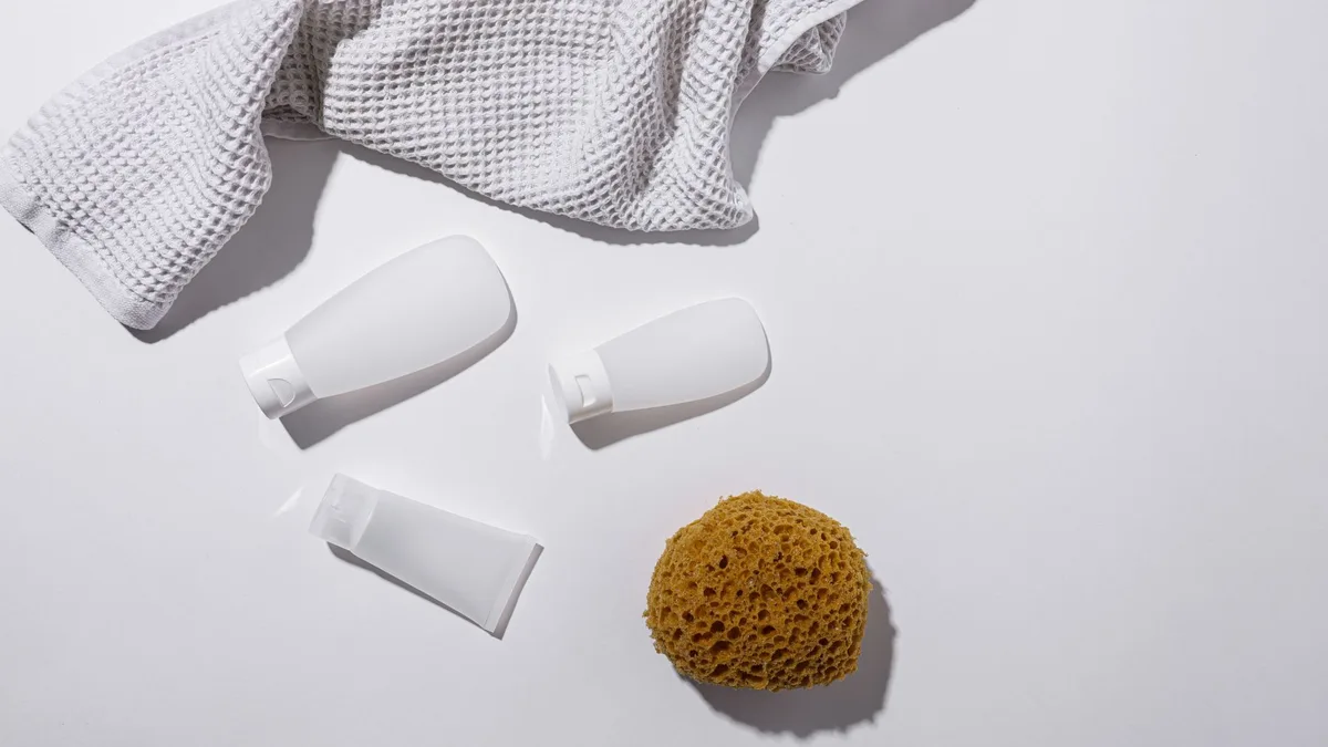 Minimalist arrangement of bathroom and haircare bottles