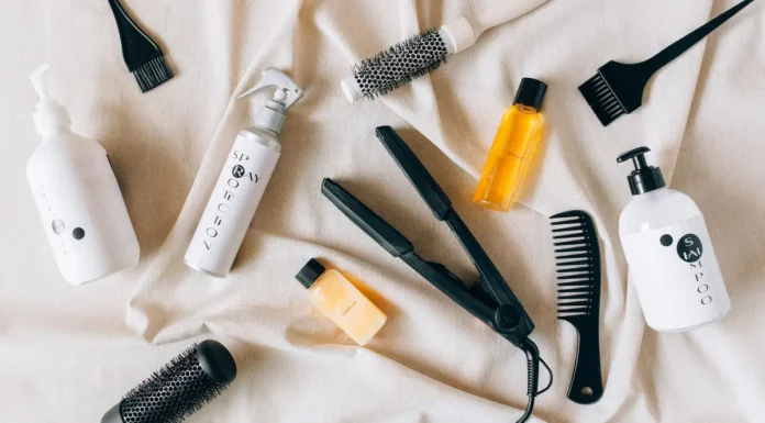 Hair Styling Tools: The Complete UK Buyer’s Guide to Heat Styling Flat lay of hair styling tools including flat iron, brush and sprays