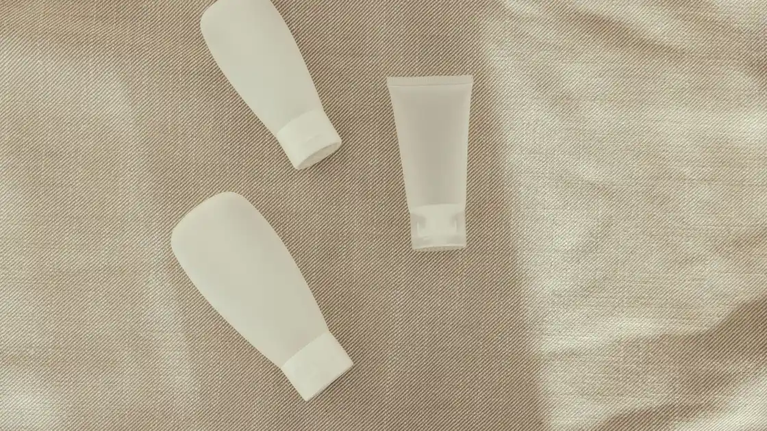 Minimalist flat lay of haircare bottles