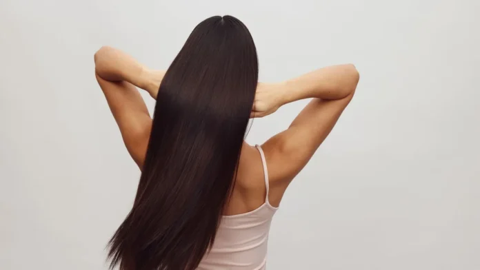 Woman with thick, full hair from behind