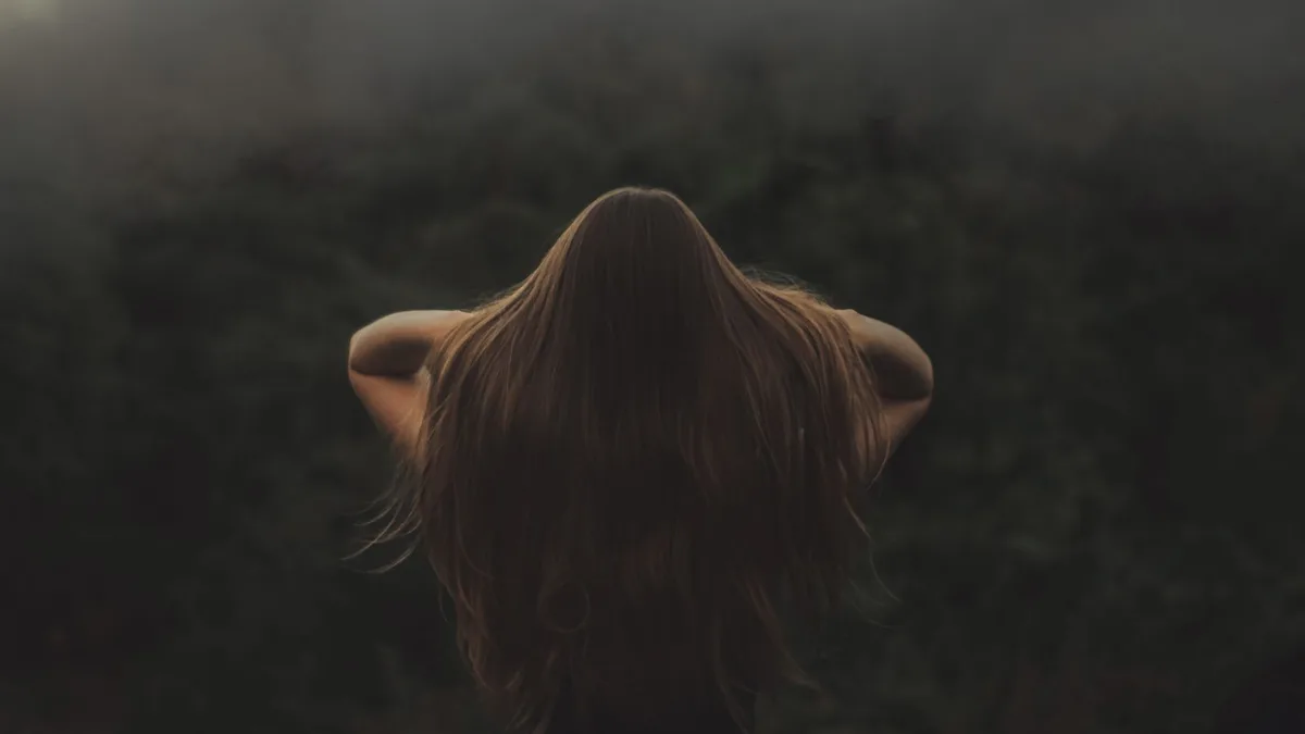 Back view of a woman with long healthy hair