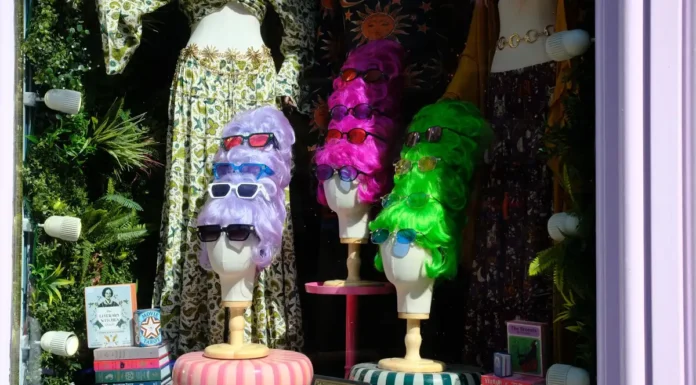 Human Hair vs Synthetic Wigs: Cost, Styling and Lifespan A display of human hair and synthetic wigs