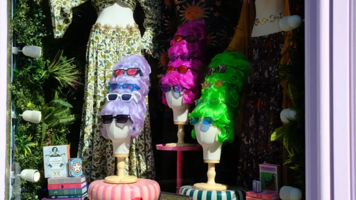 Human Hair vs Synthetic Wigs A display of human hair and synthetic wigs