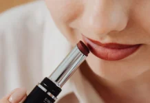 Lip Care and Lip Makeup: From Prep to Long-Wear Colour Woman applying lipstick, close-up