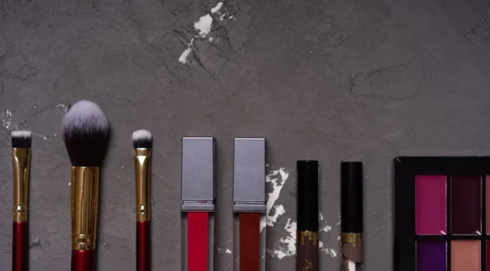 Makeup Brushes and Tools: Building and Maintaining a Kit Flat lay of makeup brushes and cosmetics