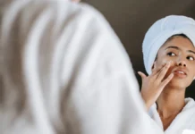 Overnight Sleeping Masks: Where They Fit in Your Routine Woman applying a nourishing night cream mask