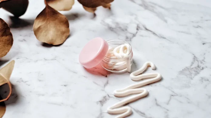 Retinol skincare cream in a glass jar