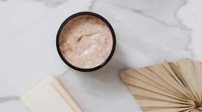 Scalp Scrub: Grit or Acid, and How Often to Actually Use One Exfoliating scalp scrub product in a jar