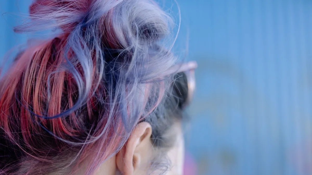 Close-up of pink and purple dyed hair