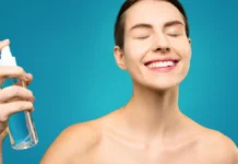 Setting Spray vs Setting Powder: When to Use Each Woman applying a setting spray mist to her face