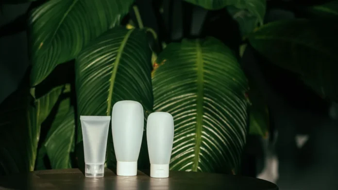 Natural vegan cosmetics with green leaves