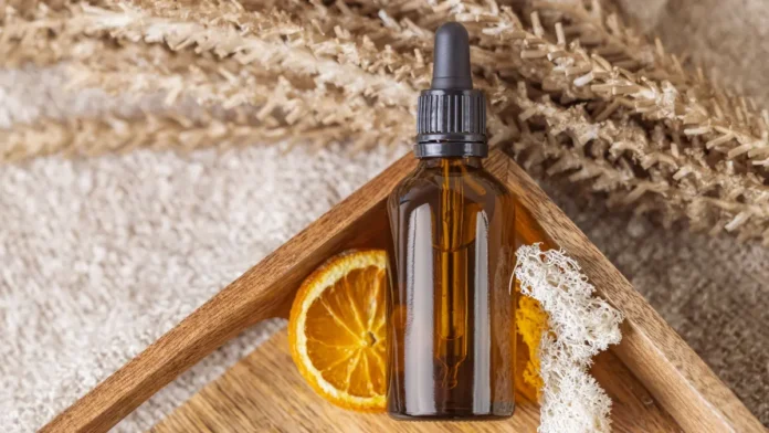 Vitamin C face serum bottle with orange slice