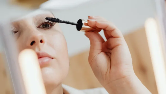 Waterproof Mascara Woman applying mascara to her eyelashes