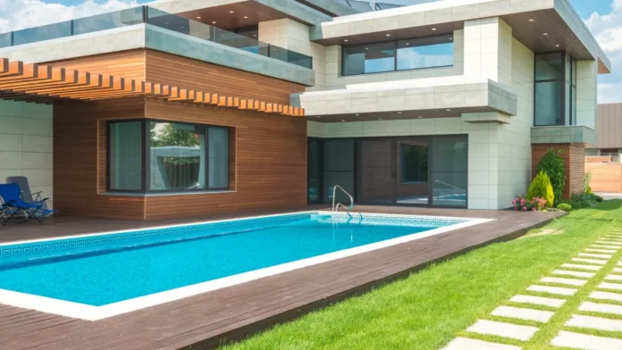 Modern luxury house with a pool and landscaped garden
