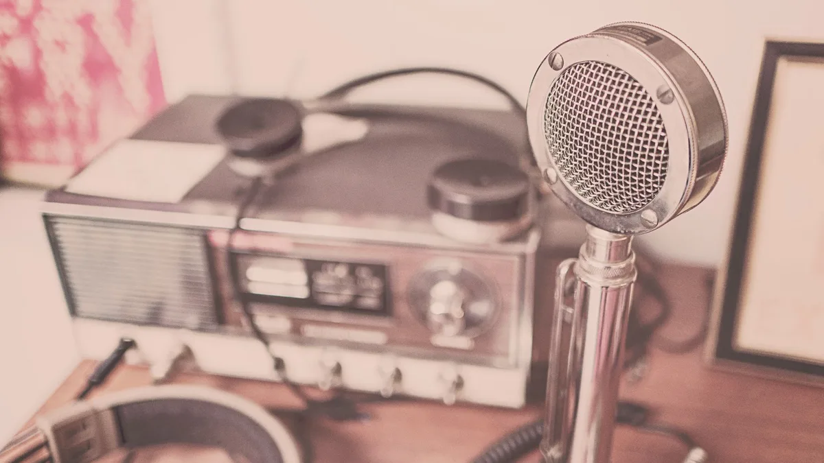 Vintage microphone and radio set with headphones