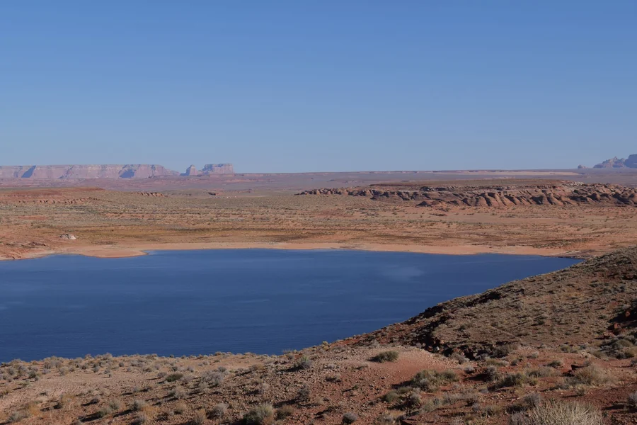 Darrell Sheets net worth - lake surrounded by Arizona desert landscape