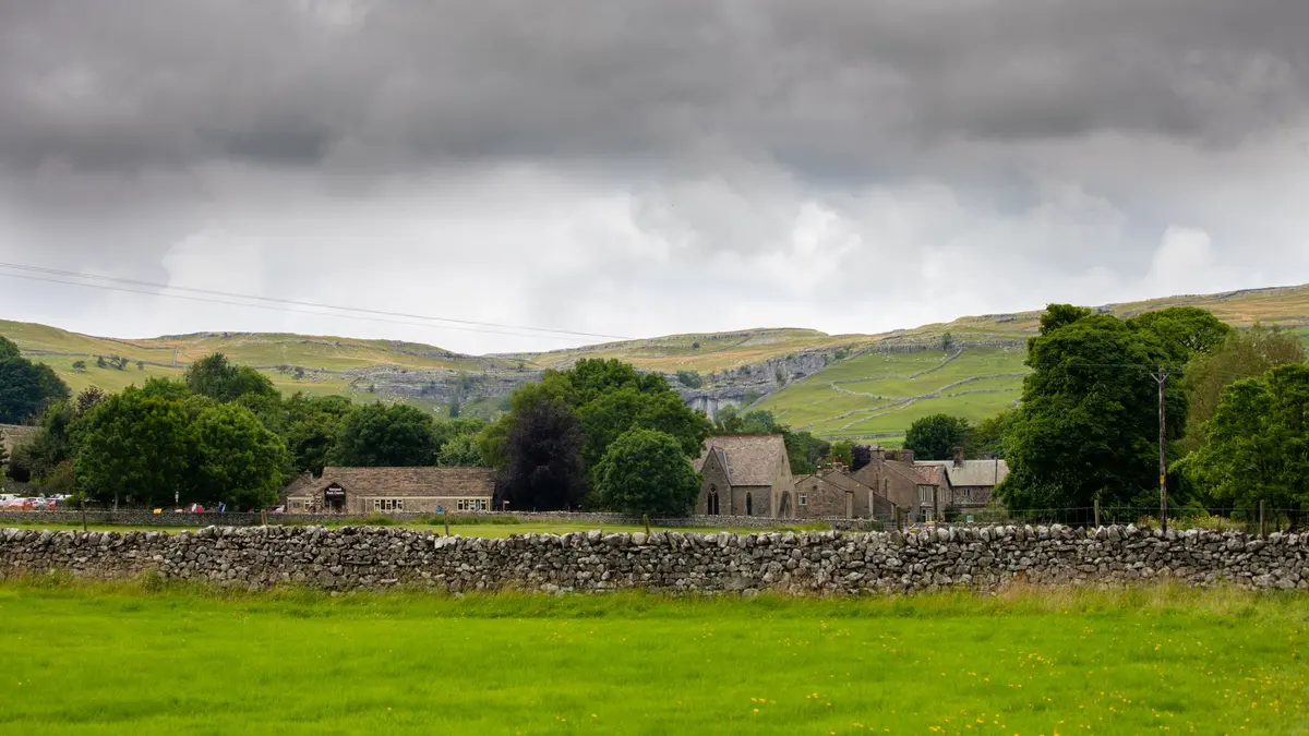 English countryside with dry stone walls and rolling hills