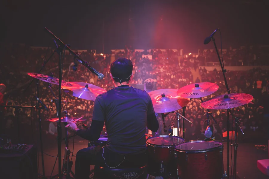 Don Henley net worth - drummer playing on stage at a live concert