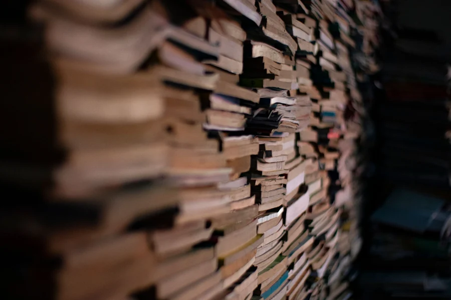 Don King net worth - a dense stack of books