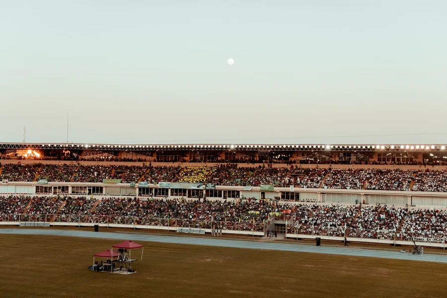 Don King net worth - crowd filling a stadium under an evening sky