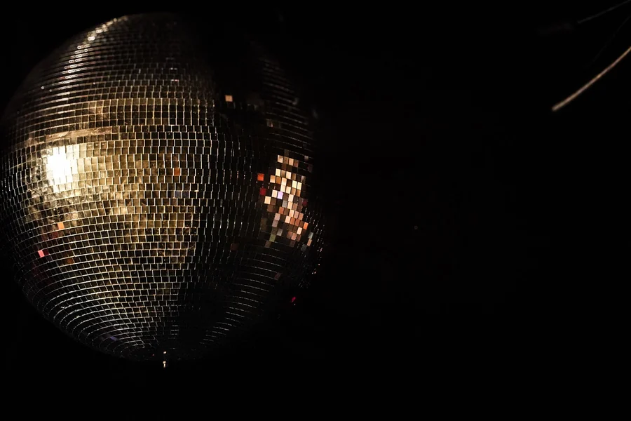 George McCrae net worth - disco ball reflecting light