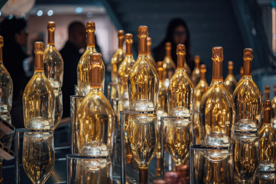 Jay-Z net worth - golden champagne bottles elegantly displayed