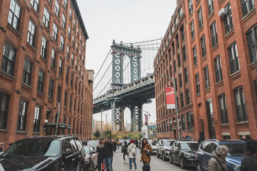 Jay-Z net worth - the Manhattan Bridge framed by buildings in Brooklyn