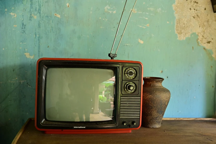 Jimmy Savile - a vintage television set in a living room