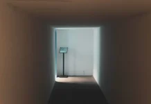 Jimmy Savile: How He Was Missed and What Changed After Jimmy Savile safeguarding lessons - an empty corridor in dim light