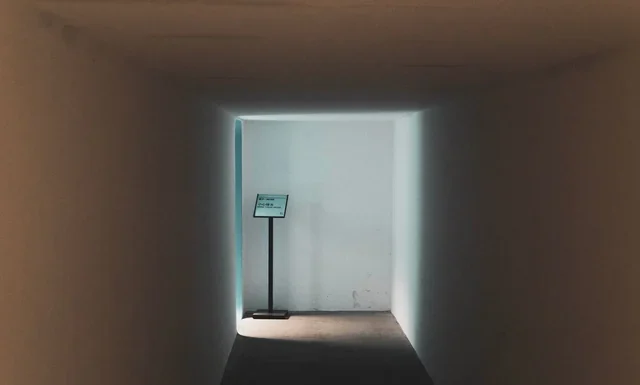 Jimmy Savile: How He Was Missed and What Changed After Jimmy Savile safeguarding lessons - an empty corridor in dim light