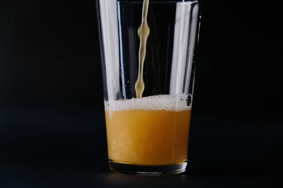 Land Shark beer UK - golden lager being poured into a glass