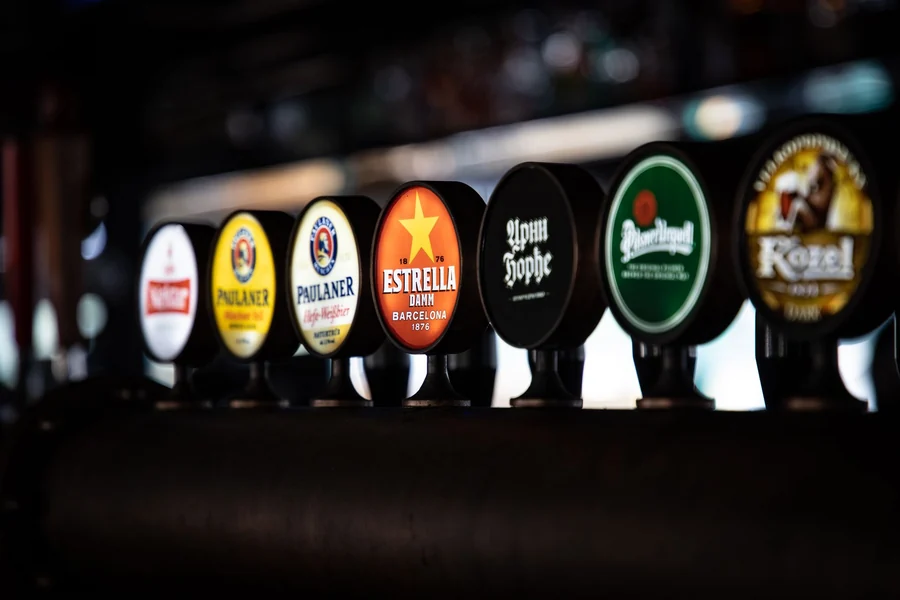 Land Shark beer UK - row of beer taps in a British bar