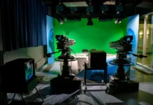 Lecy Goranson Net Worth 2026: The $3.5m Figure Is Wrong Lecy Goranson net worth - television studio sitcom set with stage lighting