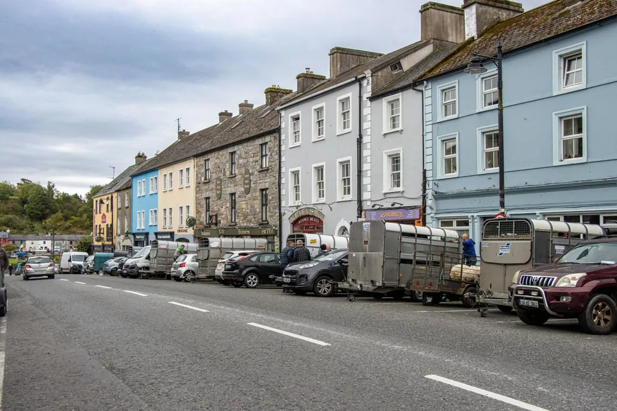 Louis Walsh net worth - colourful buildings on an Irish town street