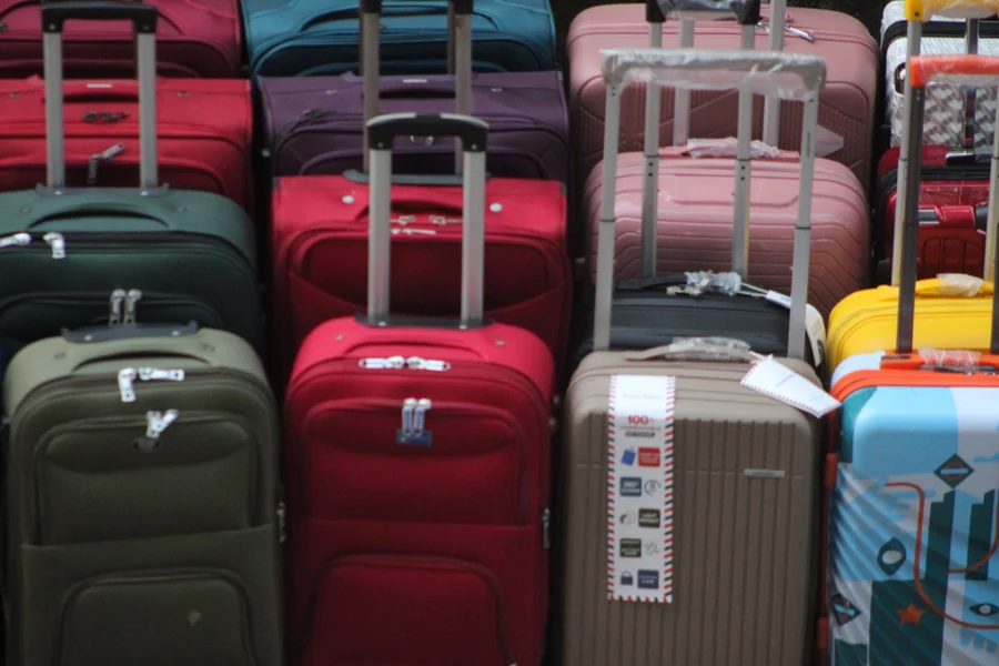 Princess Traveller suitcase review - collection of colourful suitcases stacked together