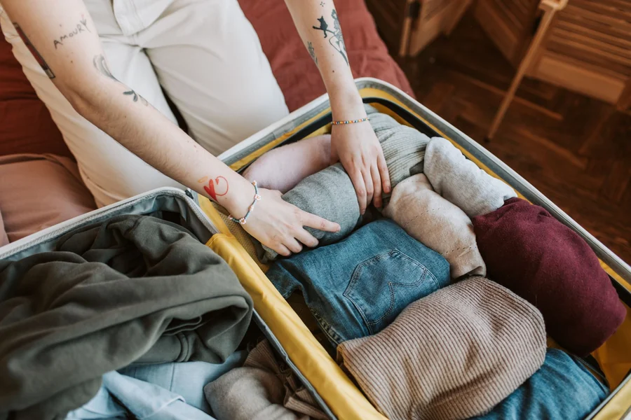 Princess Traveller suitcase review - clothes being packed into an open hard shell suitcase
