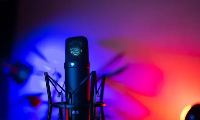 Snoop Dogg Net Worth 2026: Death Row, Olympics and Swansea Snoop Dogg net worth - microphone under colourful neon stage lighting