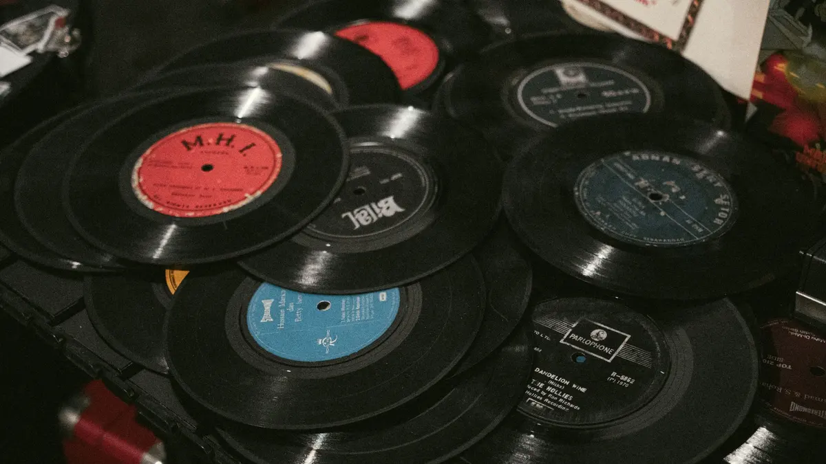 Collection of vintage vinyl records and sleeves